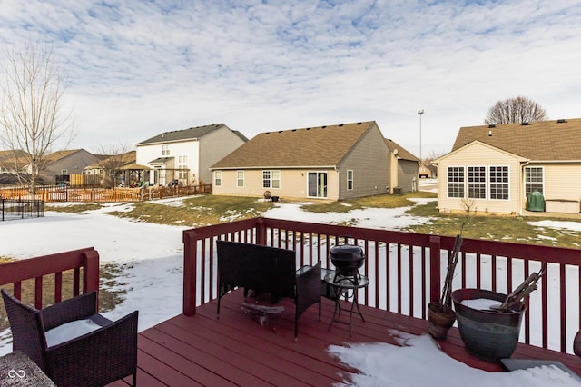 view of snow covered deck