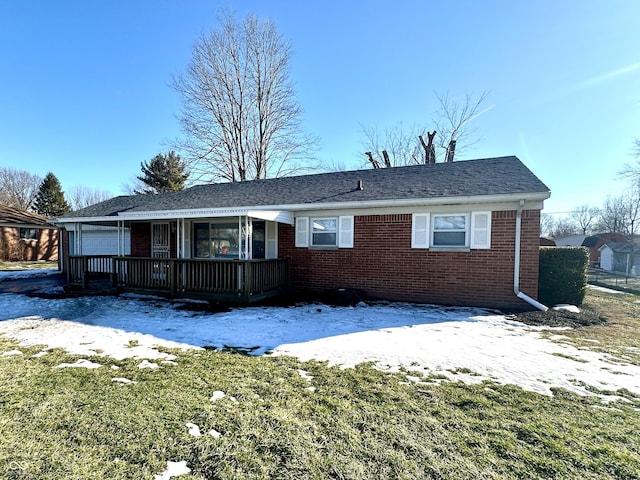 ranch-style house with a yard