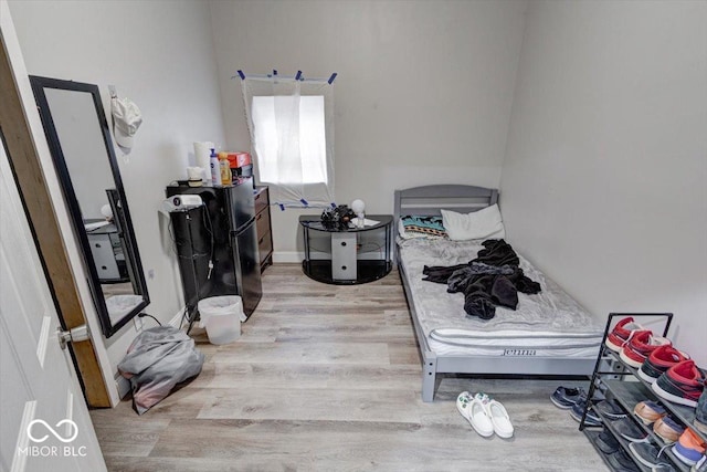 bedroom featuring light wood-type flooring