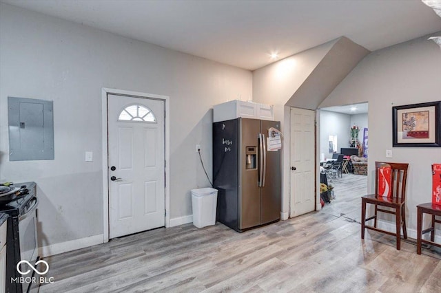 entryway with electric panel and light wood-type flooring