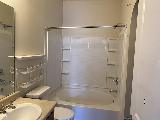 full bathroom featuring vanity, toilet, and washtub / shower combination