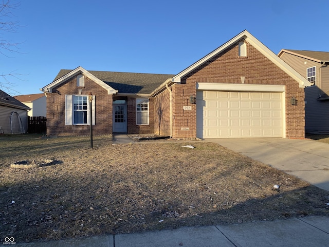 single story home featuring a garage