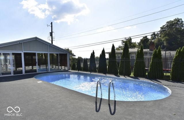 view of pool with a patio area