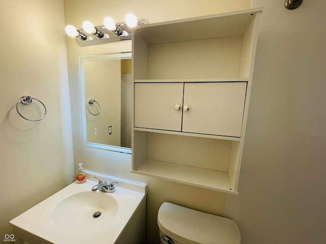 bathroom with toilet and sink