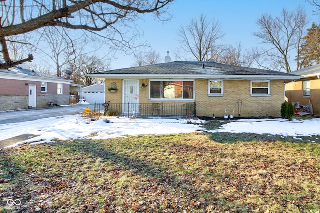 single story home featuring a garage