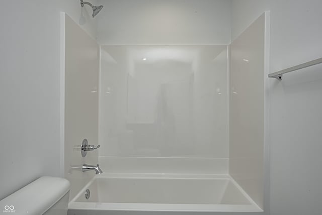 full bath with bathtub / shower combination and toilet