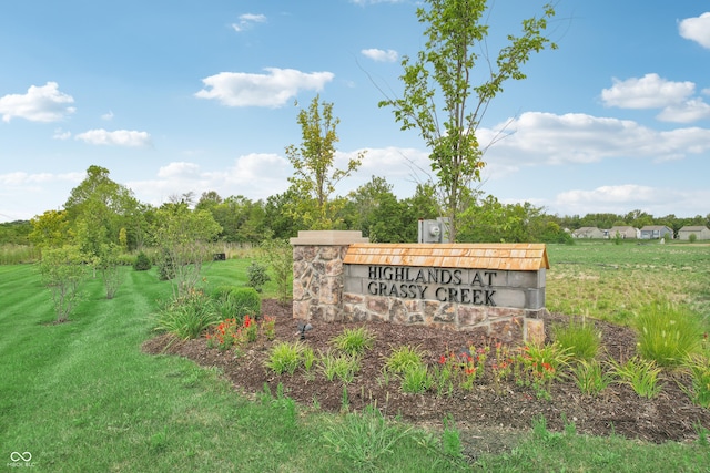 community sign with a yard