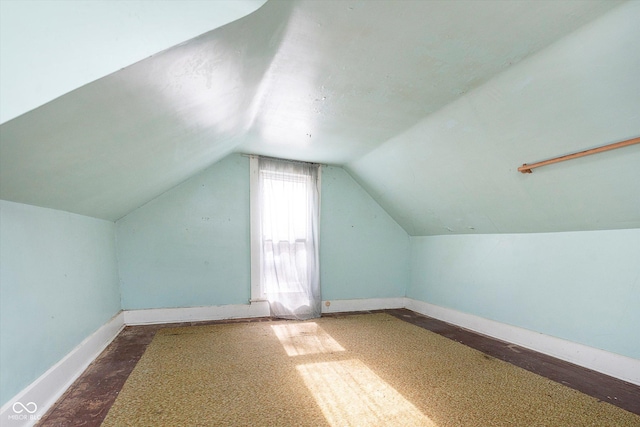 bonus room featuring vaulted ceiling