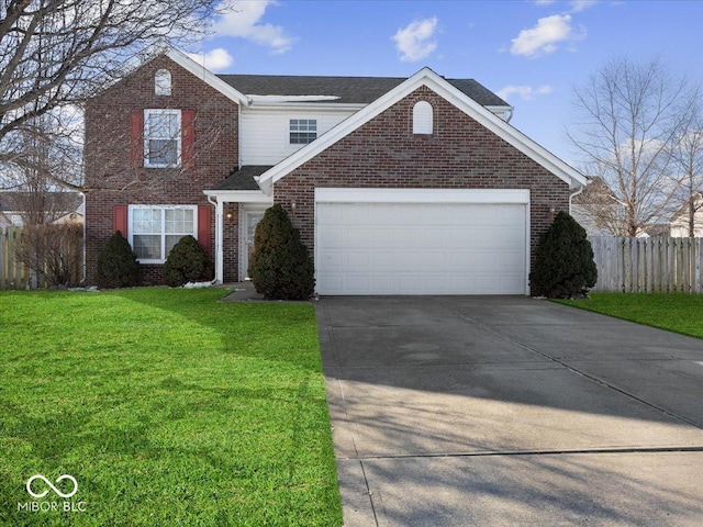 view of front property featuring a garage and a front lawn