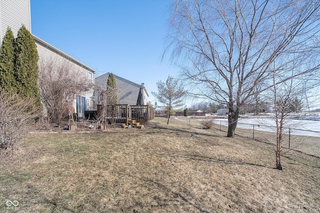 view of yard with a wooden deck