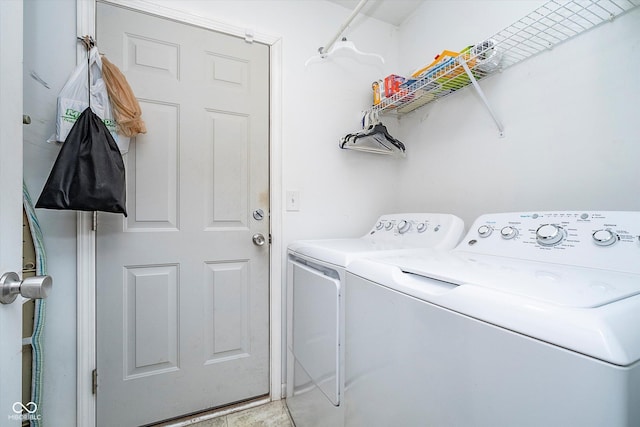 laundry area with washer and clothes dryer