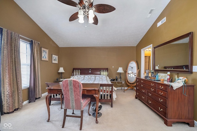 carpeted bedroom with lofted ceiling and ceiling fan