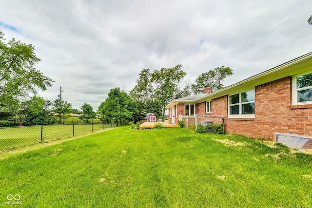 view of yard featuring a wooden deck