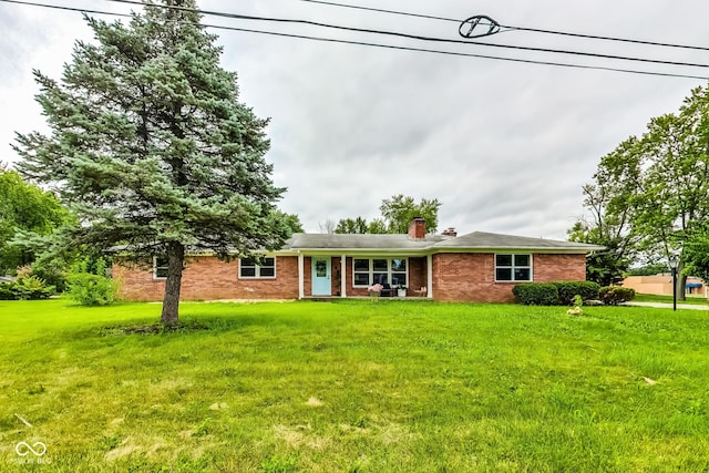 ranch-style house with a front lawn