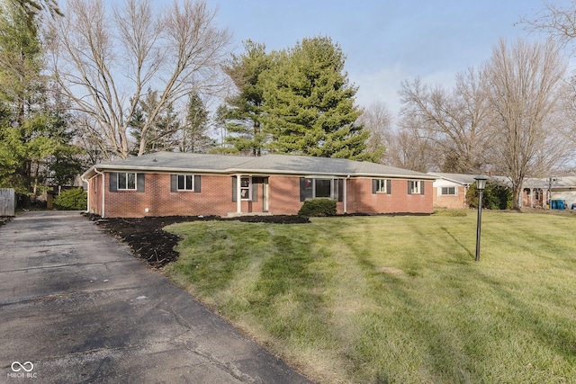 ranch-style house with a front yard