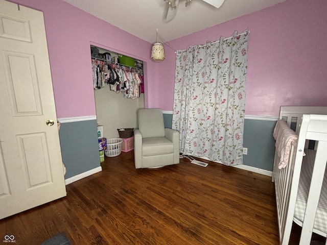 unfurnished room featuring dark wood-type flooring