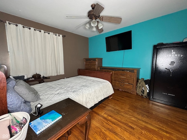 bedroom featuring ceiling fan and hardwood / wood-style floors