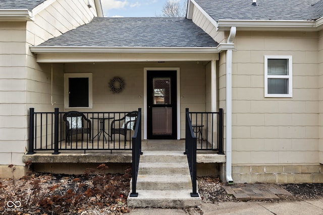 entrance to property featuring a porch