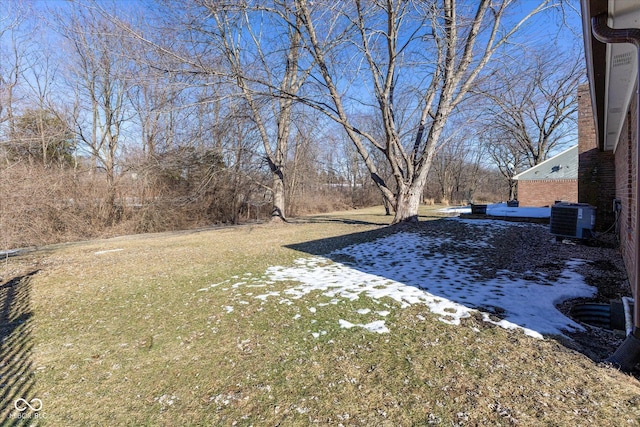 view of yard featuring central AC unit