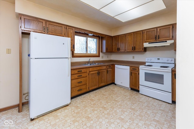 kitchen featuring sink and white appliances