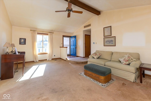 living room with lofted ceiling with beams, light colored carpet, and ceiling fan