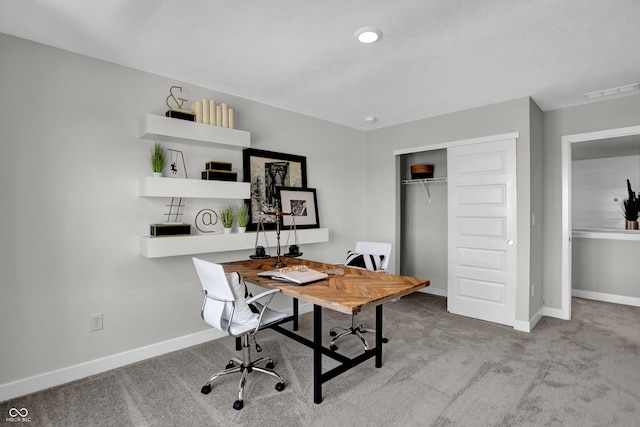 view of carpeted office space