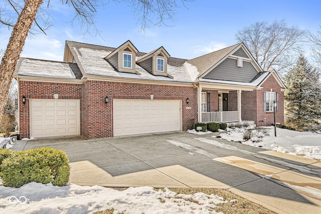 view of front of home featuring a garage and covered porch