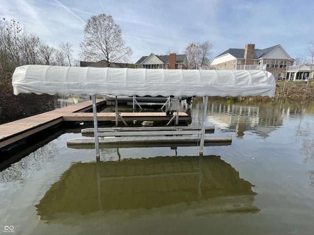 view of dock with a water view