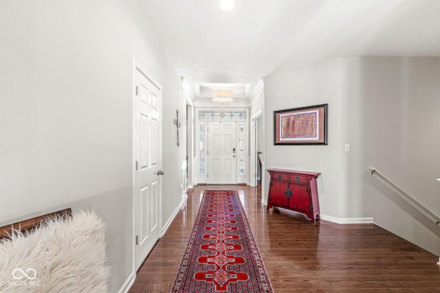 hall with dark hardwood / wood-style flooring