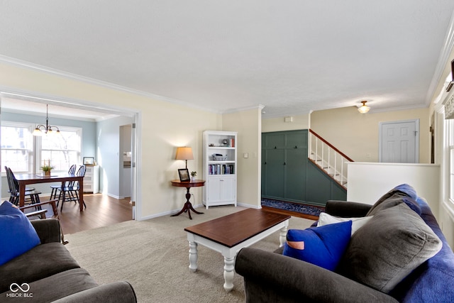 carpeted living room featuring crown molding and an inviting chandelier