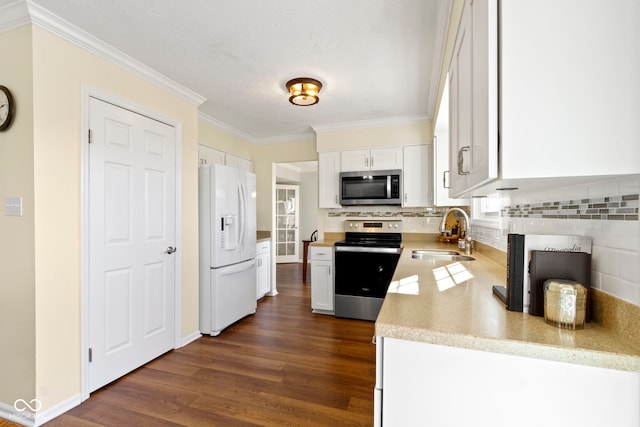 kitchen with white cabinetry, appliances with stainless steel finishes, dark hardwood / wood-style floors, and sink