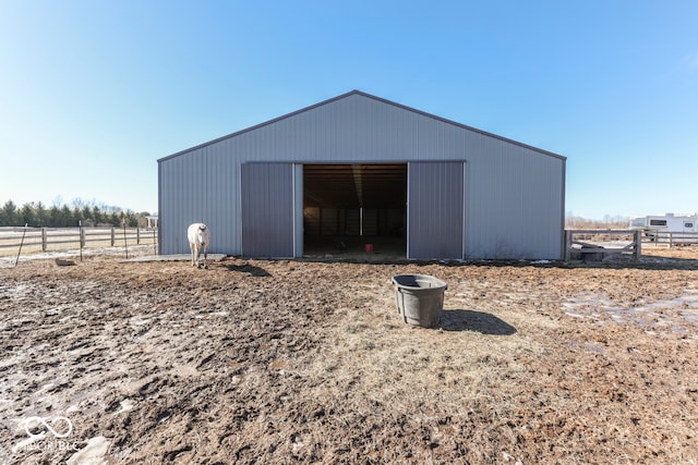 view of outdoor structure featuring a rural view