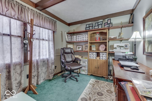 home office featuring beam ceiling, light colored carpet, and a textured ceiling