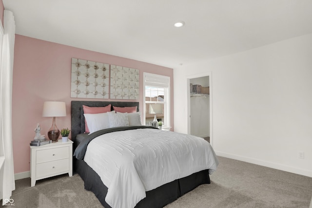 bedroom with light colored carpet