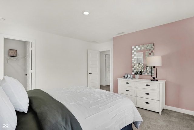 bedroom featuring light colored carpet