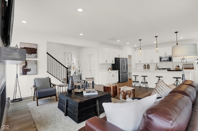 living room with hardwood / wood-style flooring