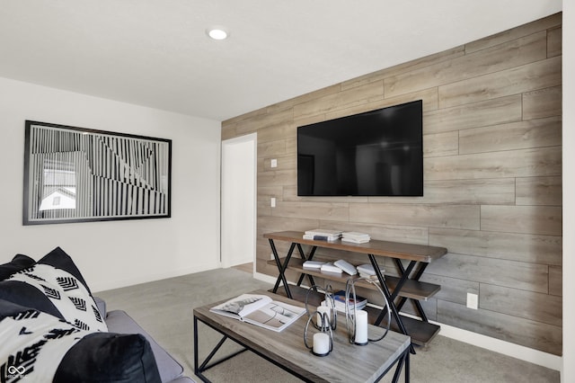 living room featuring wood walls