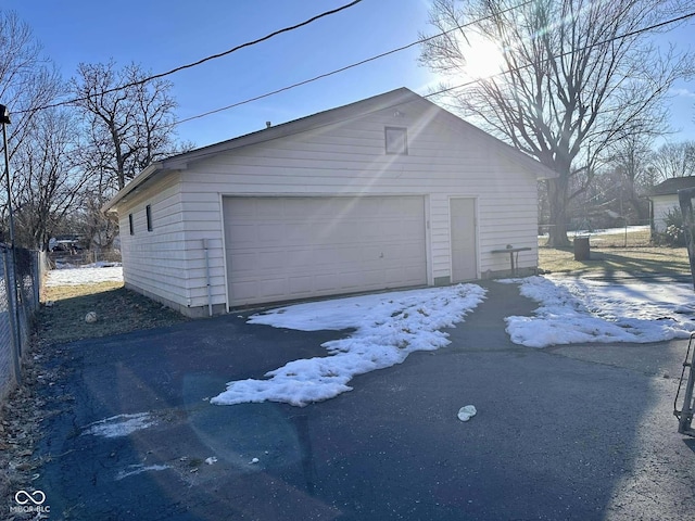 view of snow covered garage