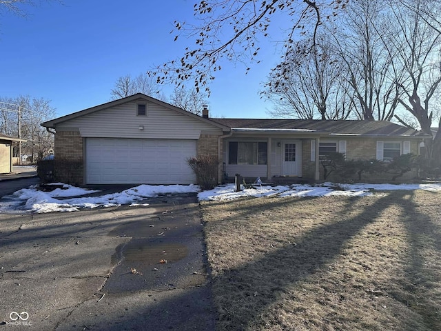 single story home with a garage