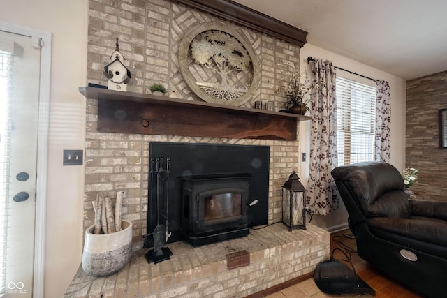 interior space with wood-type flooring and a wood stove