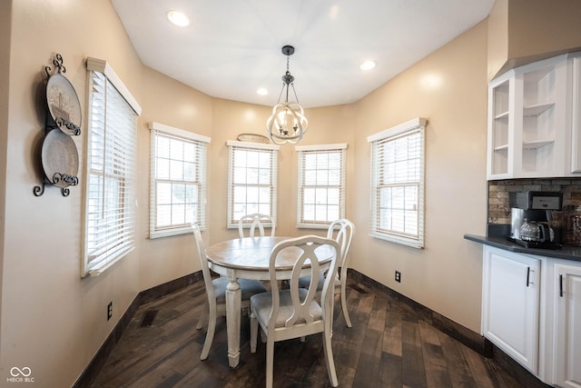 dining area featuring dark hardwood / wood-style floors