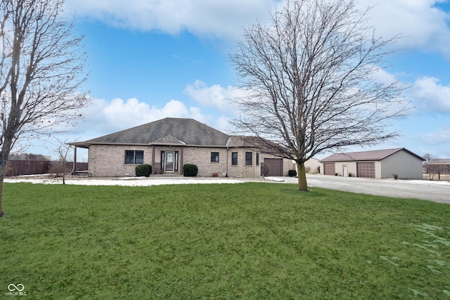 ranch-style house with a garage and a front lawn