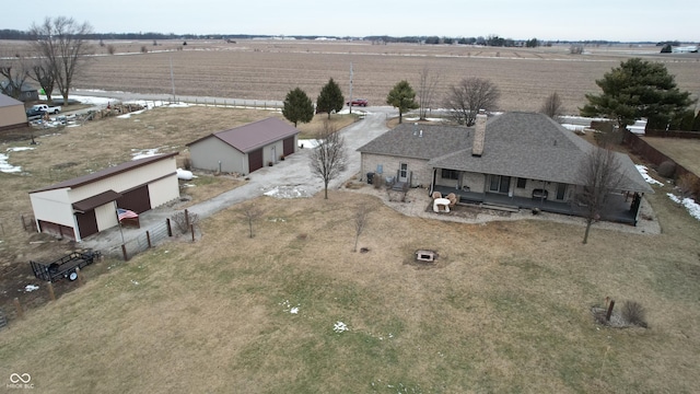 birds eye view of property featuring a rural view