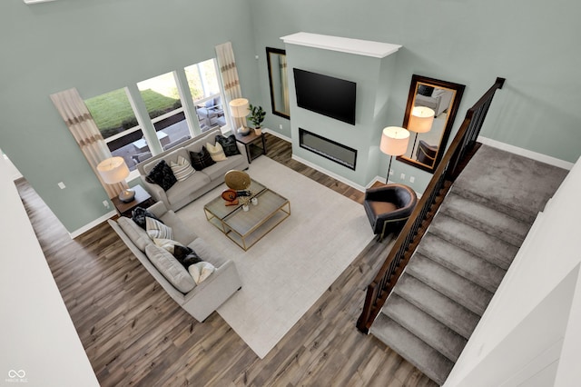 living room featuring dark hardwood / wood-style flooring