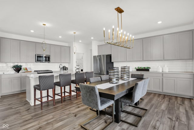 dining room with light hardwood / wood-style flooring