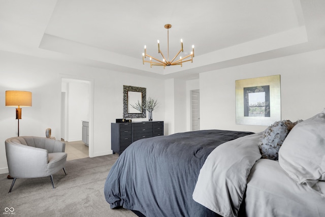 carpeted bedroom with a raised ceiling and a notable chandelier