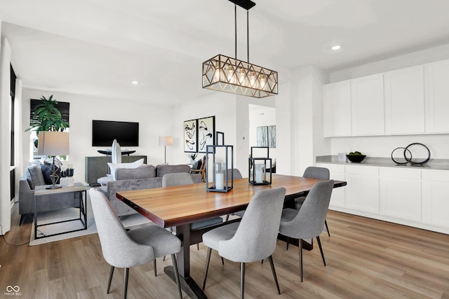 dining space featuring light hardwood / wood-style floors