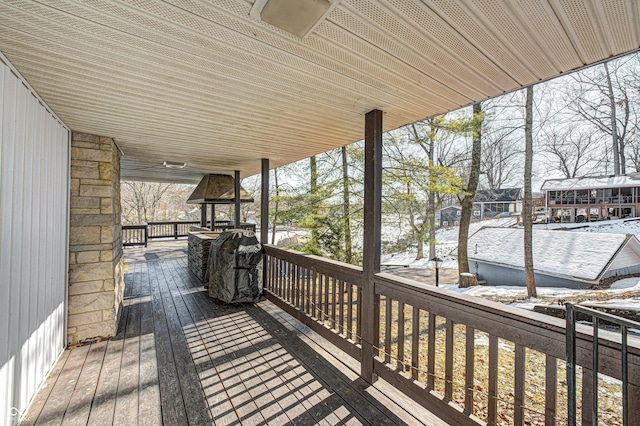 view of snow covered deck