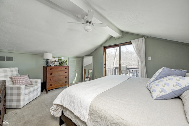 carpeted bedroom featuring ceiling fan, access to exterior, a textured ceiling, and vaulted ceiling with beams