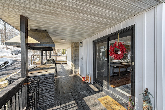 view of snow covered deck